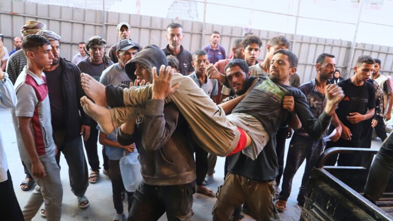 Israeli Troops Kill 32 People Seeking Food At U.S.-Backed Distribution Hubs, Gaza Officials Say